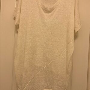 Central Park West Cream Short Sleeve knit Top. Asymmetrical hem. Large